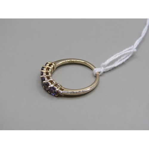 1598 - GOLD PURPLE SPINEL RING, SIZE N