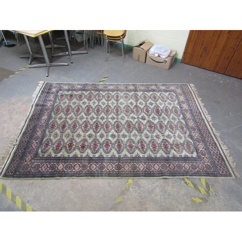 1969 - ORIENTAL FAWN AND RED GROUND PATTERNED RUG 189 x 290 cms