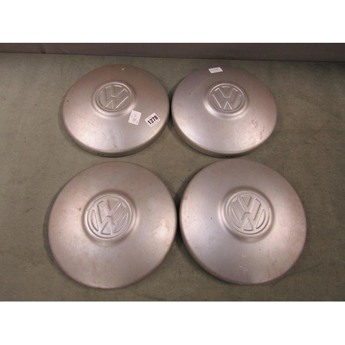 1278 - SET OF FOUR VW CAR HUBS, 26CM DIAM