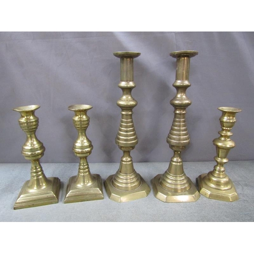 1289 - TWO PAIRS OF ANTIQUE BRASS CANDLESTICKS; ONE OTHER - LARGEST 31CM H