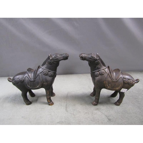 1333 - PAIR OF CAST IRON FIRE DOGS FASHIONED AS HORSES, 20CM H