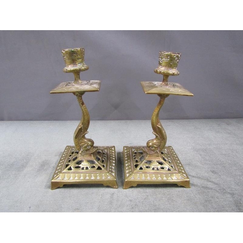 1377 - PIERCED BRASS CANDLESTICKS WITH DOLPHIN STEMS, 19CM H