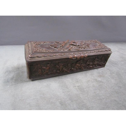 1384 - CAST BRONZED BOX DECORATED IN RELIEF WITH FRIEZE OF CHERUBS, 26CM W