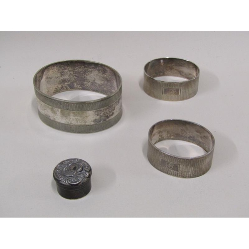 1457 - THREE NAPKIN RINGS; SMALL SILVER BOX