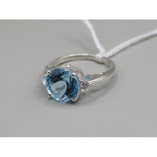 1505 - SILVER BLUE TOPAZ SET RING SIZE O