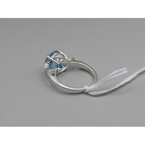 1505 - SILVER BLUE TOPAZ SET RING SIZE O