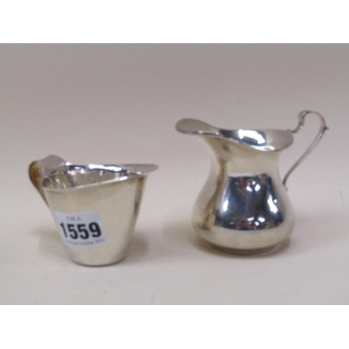 1559 - TWO SILVER CREAM JUGS