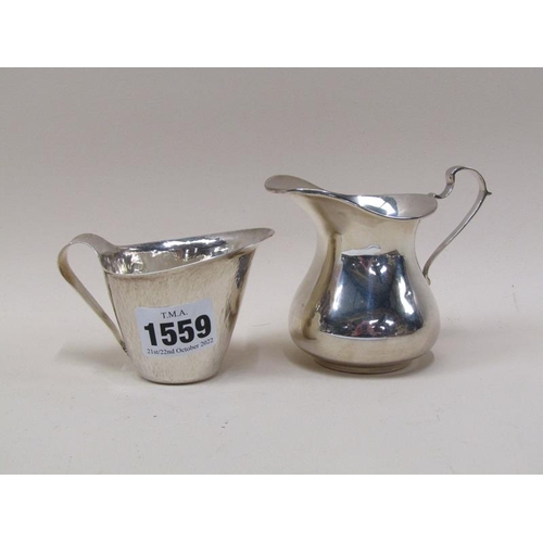 1559 - TWO SILVER CREAM JUGS