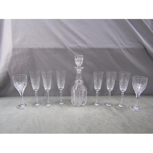 1811 - CRYSTAL CHAMPAGNES AND WINES AND ONE DECANTER - 35cms H