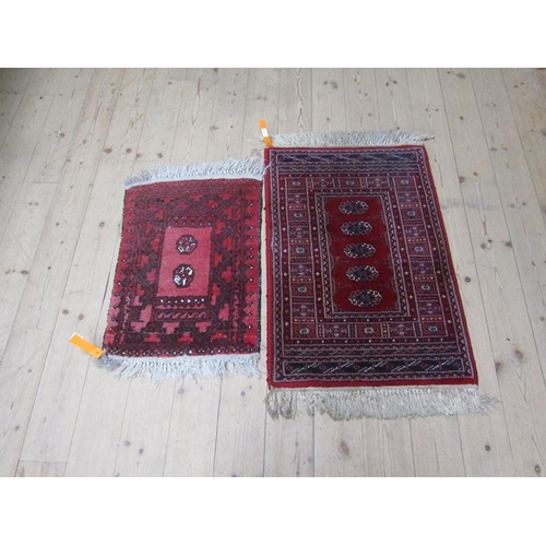 1939 - TWO ORIENTAL WOOLLEN GROUND RUGS