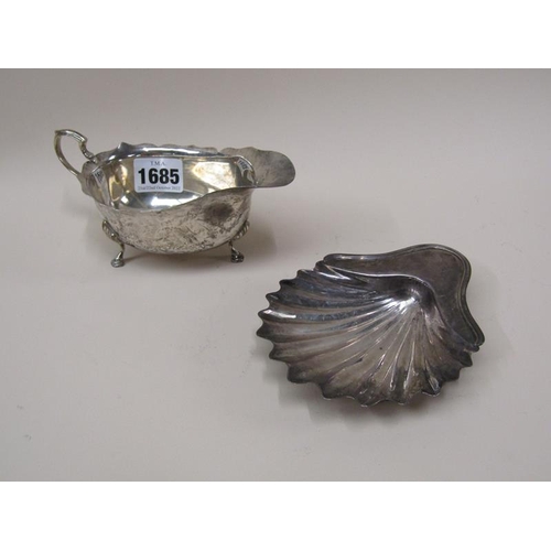 1685 - SILVER SHELL BUTTER DISH AND A SILVER SAUCEBOAT