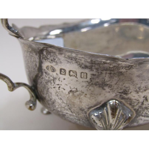 1685 - SILVER SHELL BUTTER DISH AND A SILVER SAUCEBOAT