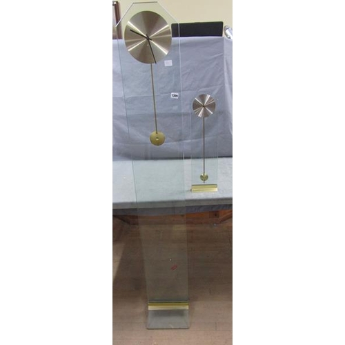 1309 - TWO CLEAR GLASS CASED PANEL PENDULUM CLOCKS, ONE BEING A MANTEL, ONE A FLOOR - LARGEST 169cms H