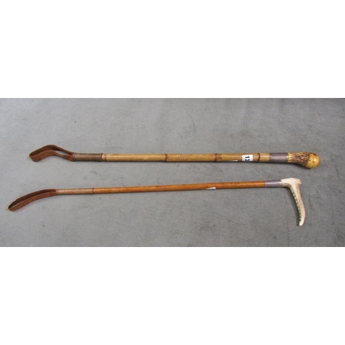 1319 - TWO RIDING CROPS WITH HORN AND ANTLER HANDLES AND SILVER BANDING - 69cms L