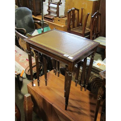 778 - NEST OF THREE LEATHER TOP TABLES