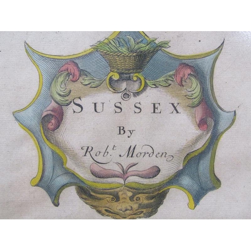 1281 - A Robert Morden map of Sussex, part coloured, framed and glazed, the map 34cm x 42cm.