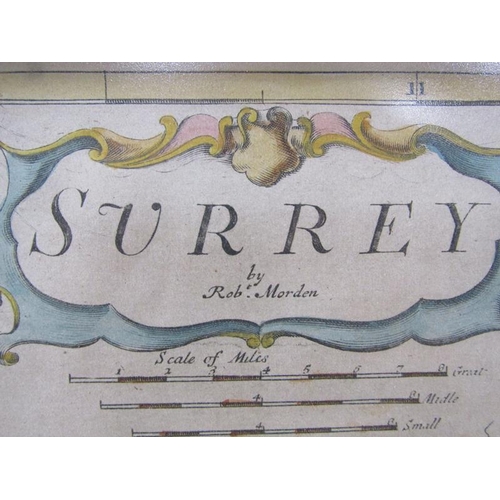 1283 - A Robert Morden map of Surrey, part coloured, framed and glazed, the map 35cm x 42cm.