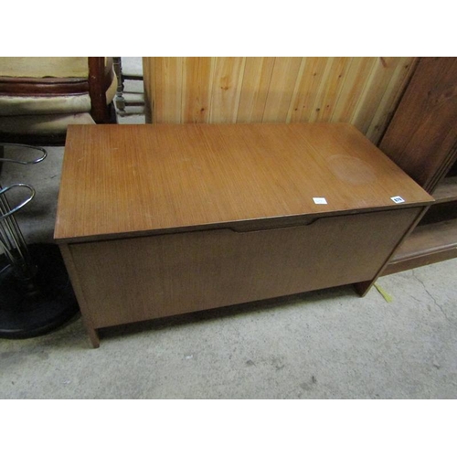 876 - TEAK TRUNK AND CONTENTS