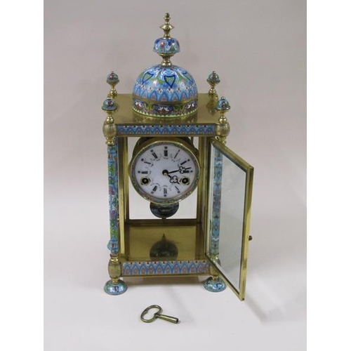 1323 - A mid 20c four glass clock in rectangular case with domed top.  The front and rear are glazed and th... 