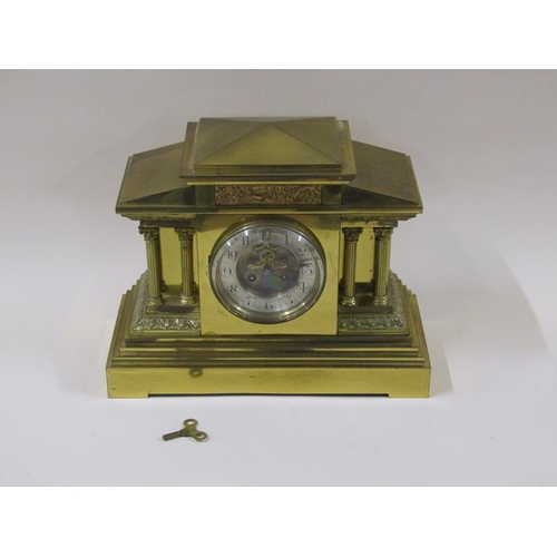 1324 - A late 19c French mantel clock in architectural polished brass case, the 12cm dial flanked by fluted... 