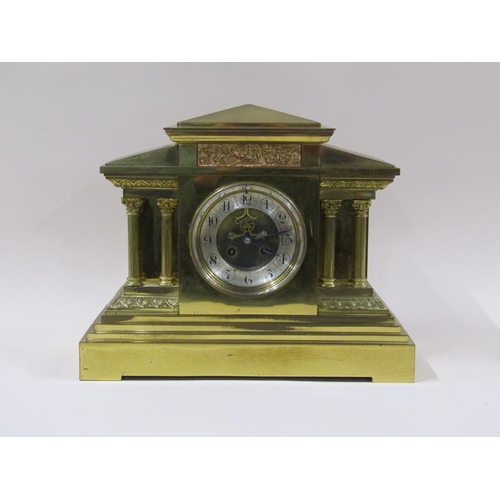 1324 - A late 19c French mantel clock in architectural polished brass case, the 12cm dial flanked by fluted... 