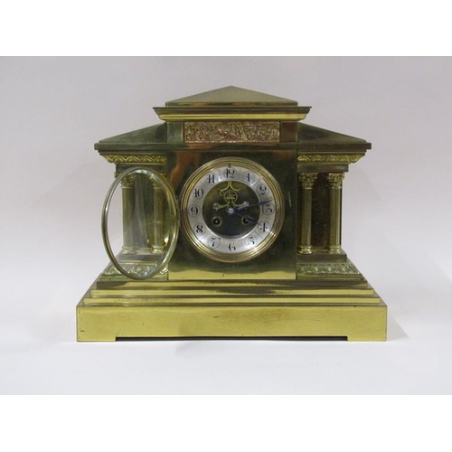 1324 - A late 19c French mantel clock in architectural polished brass case, the 12cm dial flanked by fluted... 