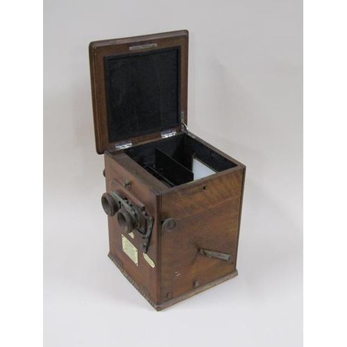 1336 - An early 20c French stereoscope by Richard Fréres, 'Le Taxiphote' and numbered 3466.  It has two ach... 