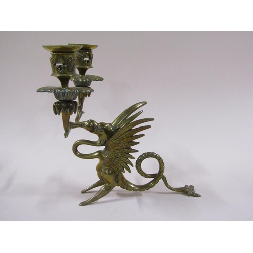 1450 - A pair of late 19c brass griffin two branch candelabrum, 22cm h, a/f.