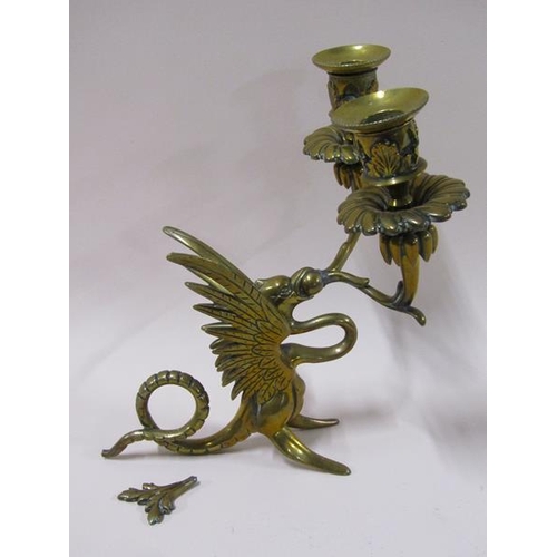 1450 - A pair of late 19c brass griffin two branch candelabrum, 22cm h, a/f.