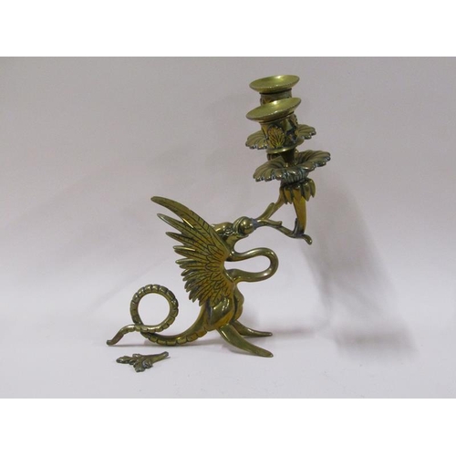 1450 - A pair of late 19c brass griffin two branch candelabrum, 22cm h, a/f.