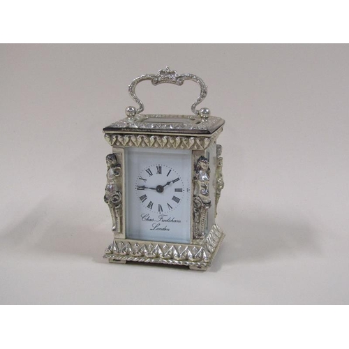 1519 - A late 20c carriage timepiece by Charles Frodsham of London in ornate silver case, glazed all round ... 