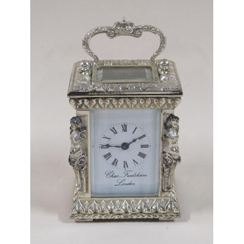 1519 - A late 20c carriage timepiece by Charles Frodsham of London in ornate silver case, glazed all round ... 