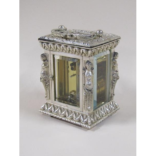 1519 - A late 20c carriage timepiece by Charles Frodsham of London in ornate silver case, glazed all round ... 