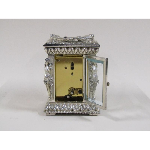 1519 - A late 20c carriage timepiece by Charles Frodsham of London in ornate silver case, glazed all round ... 