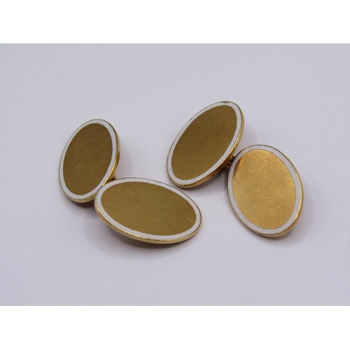 1544 - A pair of 18ct gold enamel bordered cufflinks, 15.3g.