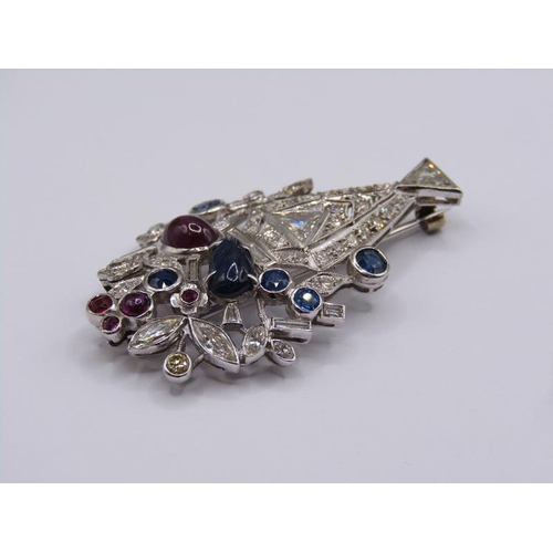 1592 - A white gold diamond, sapphire and ruby set brooch in the form of a vase of flowers, 4.23cm h.