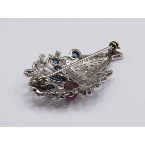 1592 - A white gold diamond, sapphire and ruby set brooch in the form of a vase of flowers, 4.23cm h.