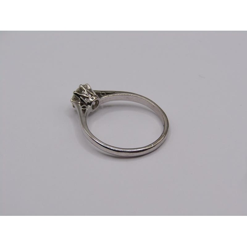 1597 - An 18ct white gold diamond solitaire ring, the diamond approx. 0.6ct, size P.