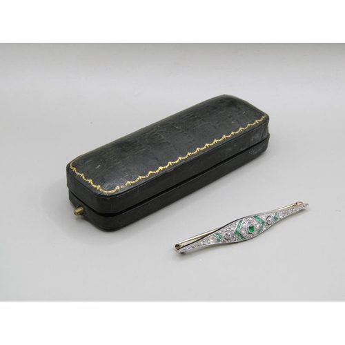 1605 - A gold diamond and emerald set bar brooch, 5.5cm w.