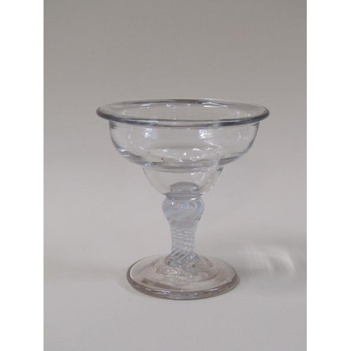 1865 - A mid 18c sweetmeat glass with a lipped double ogee bowl on opaque twist stem with shoulder knop on ... 