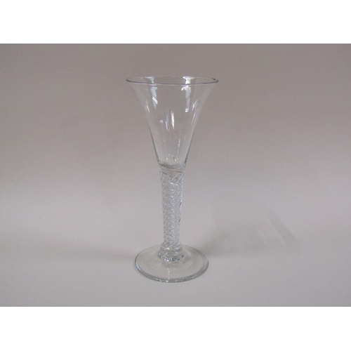 1867 - A late 18c Ale glass with a drawn trumpet bowl on a single air twist stem with base knop and circula... 