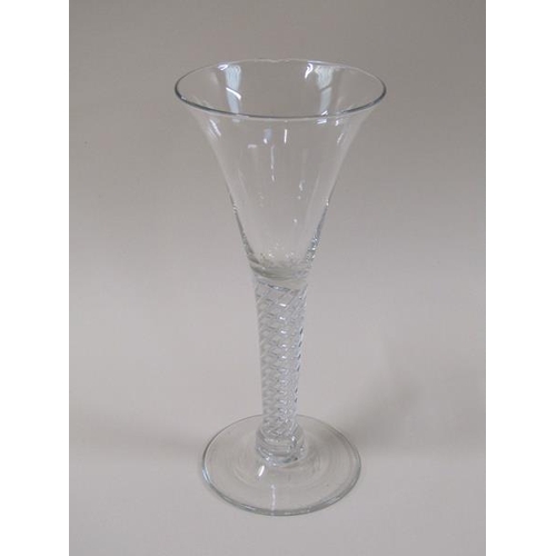 1867 - A late 18c Ale glass with a drawn trumpet bowl on a single air twist stem with base knop and circula... 