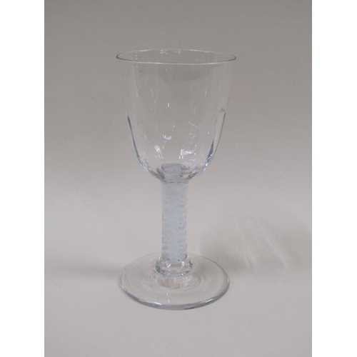 1881 - An 18c Ale glass with a half facet round funnel bowl on a double series opaque twist stem with a dom... 