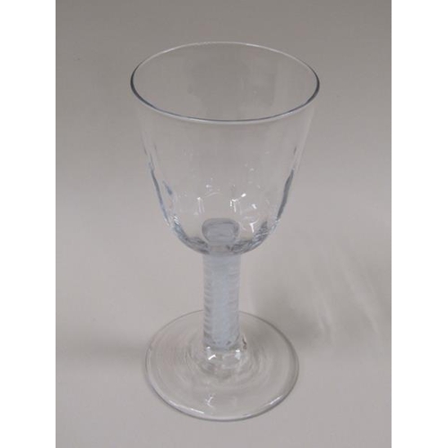 1881 - An 18c Ale glass with a half facet round funnel bowl on a double series opaque twist stem with a dom... 