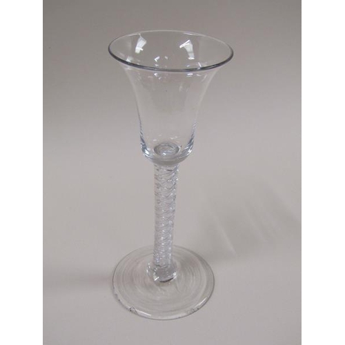 1884 - An 18c wine glass with a bell shaped bowl on a double series air twist stem with a domed foot, 16cm ... 