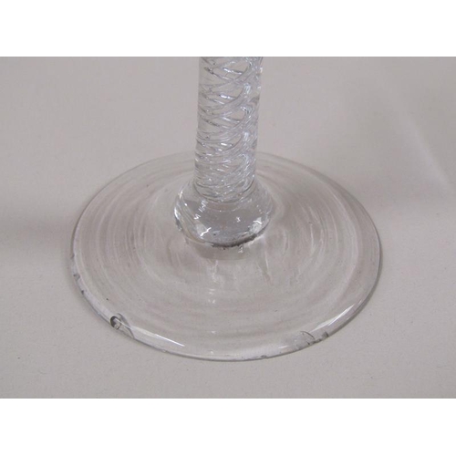 1884 - An 18c wine glass with a bell shaped bowl on a double series air twist stem with a domed foot, 16cm ... 