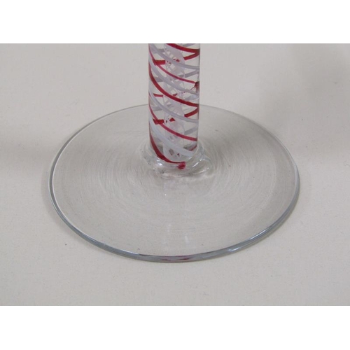 1886 - A late 18c/early 19c  wine glass with bell shaped bowl on a red and opaque white triple series stem ... 