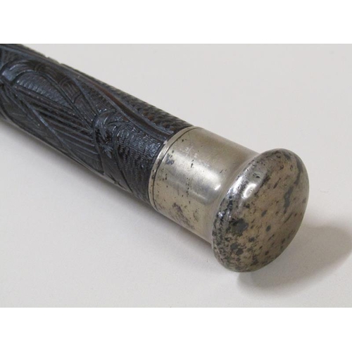 1455 - A 19c bog oak walking stick carved with trailing clover leaf and with silver knob handle and with ba... 