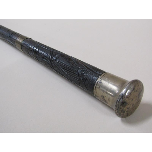 1455 - A 19c bog oak walking stick carved with trailing clover leaf and with silver knob handle and with ba... 