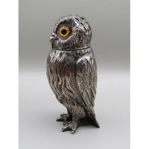 1535 - A mid Victorian silver owl pepper pot with glass eyes, makers mark for Daniel & Charles Hurle, Londo... 